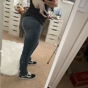 Mid rise dark wash skinny jeans